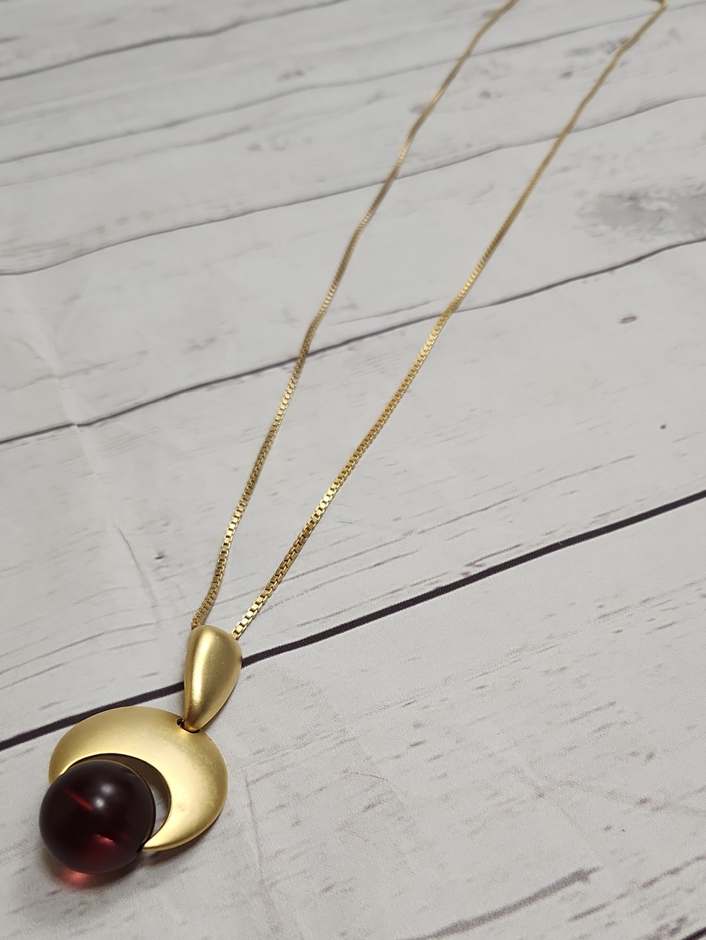 Gold Pendant Necklace with Deep Reddish Purple Orb